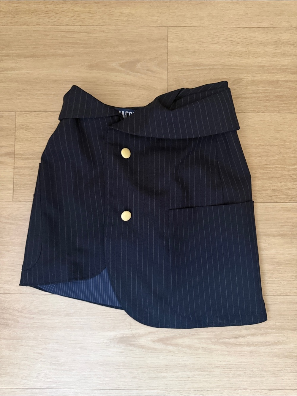 Jacquemus Asymmetrical Pinstripe Mini Wool Skirt with Buttons - Black
